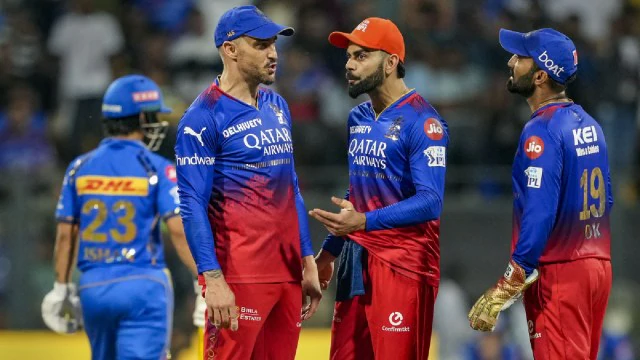 Royal Challengers Bengaluru's Virat Kohli, Faf du Plessis and Dinesh Karthik during the IPL 2024 cricket match against Royal Challengers Bengaluru and Mumbai Indians at Wankhede Stadium, in Mumbai, Thursday, April 11, 2024. (PTI Photo)